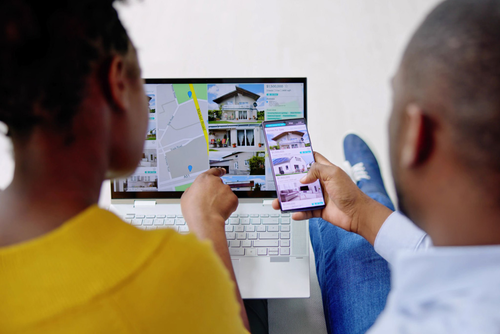 Homebuyer using digital tools to search for properties online.